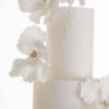 Details of elegant hand-crafted decorative sugar flowers on luxury contemporary wedding cake, Chic Flowers, by Decorum Taste.