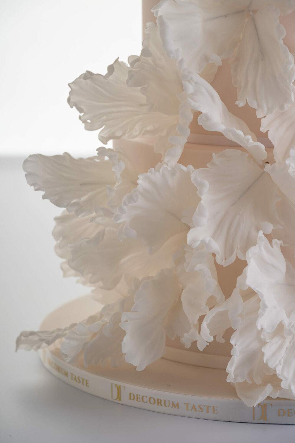 Details of the hand-crafted sugar flower petals on the luxury customisable wedding cake, Eloise, by Decorum Taste.