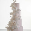 Four tier elegant contemporary customisable wedding cake, Eloise, in soft blush with large hand-crafted sugar flowers, by Decorum Taste.