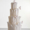 Four tier luxury contemporary, customisable, wedding cake, Modern Ruffles by Decorum Taste, with textured decorative folds and hand-crafted sugar flower stems.