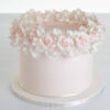 Single tier luxury contemporary, customisable, celebration cake, Ring of Roses by Decorum Taste, in blush pink with ring of hand-crafted sugar roses and petals at the top.