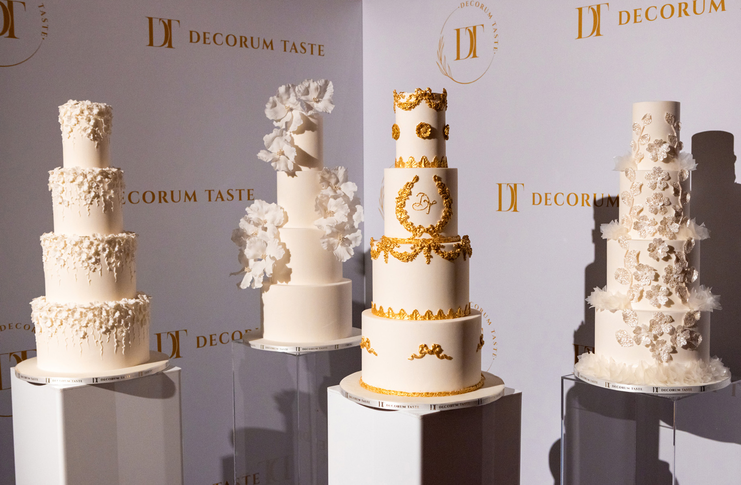 DT collection stands proud in front of Decorum Taste step and repeat board